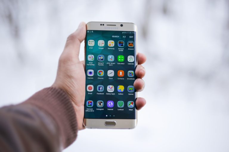 man holding smartphone