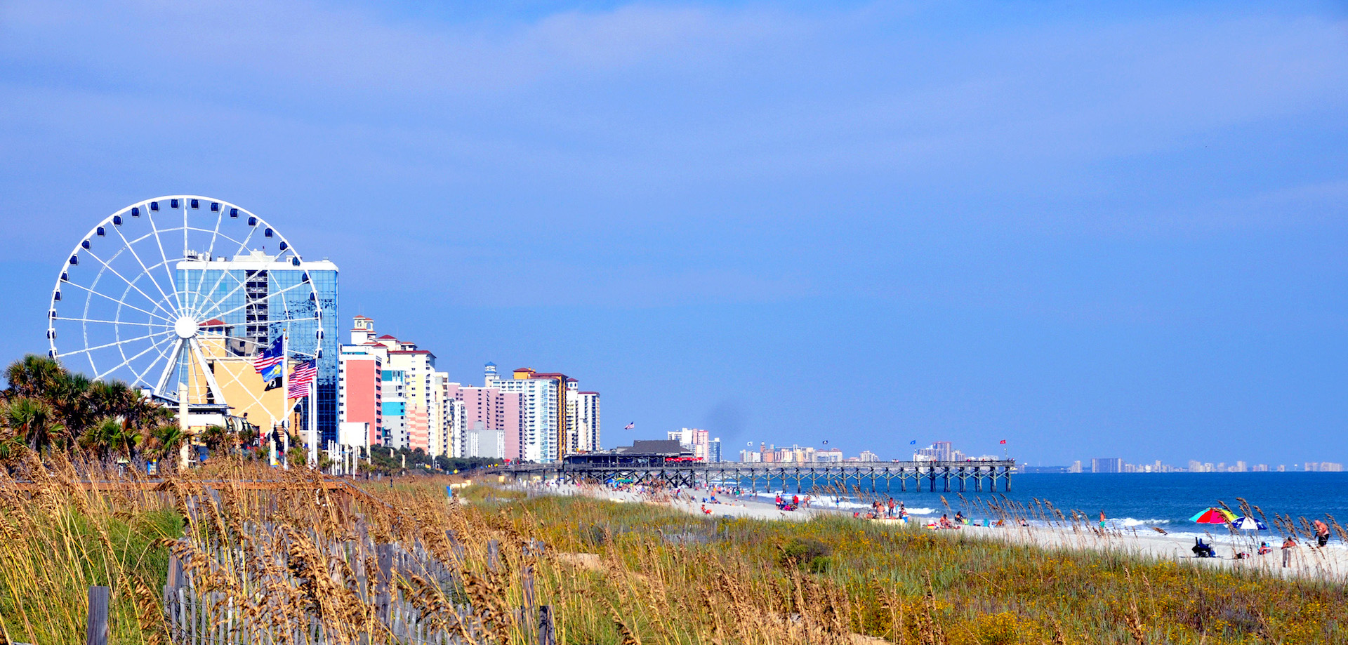 View of Myrtle Beach with ferris wheel, hotels and ocean