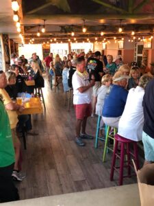 A big group of people having fun and dining in Harolds on the Beach bar and grill in North Myrtle Beach is shedA big group of people having fun and dining in Harolds on the Beach bar and grill in North Myrtle Beach a shag club